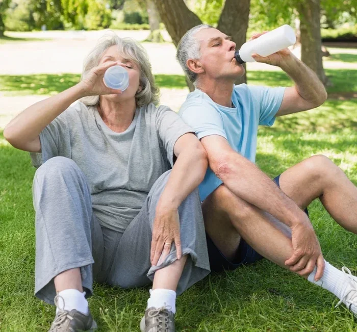 Couple staying active outdoors alongside a GlucoBliss routine